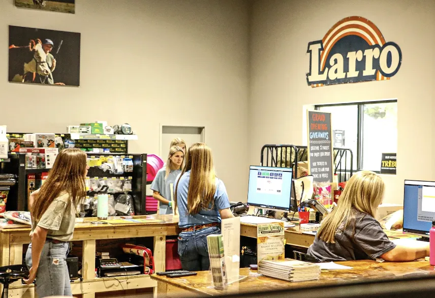 The Lowry's team helping customers at the front counter