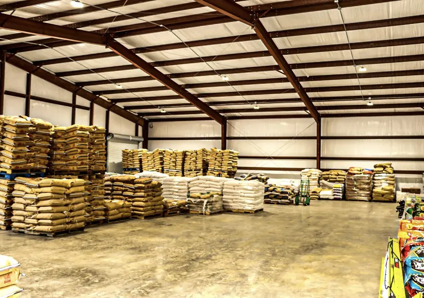 Pallets of feed in the Lowry's warehouse